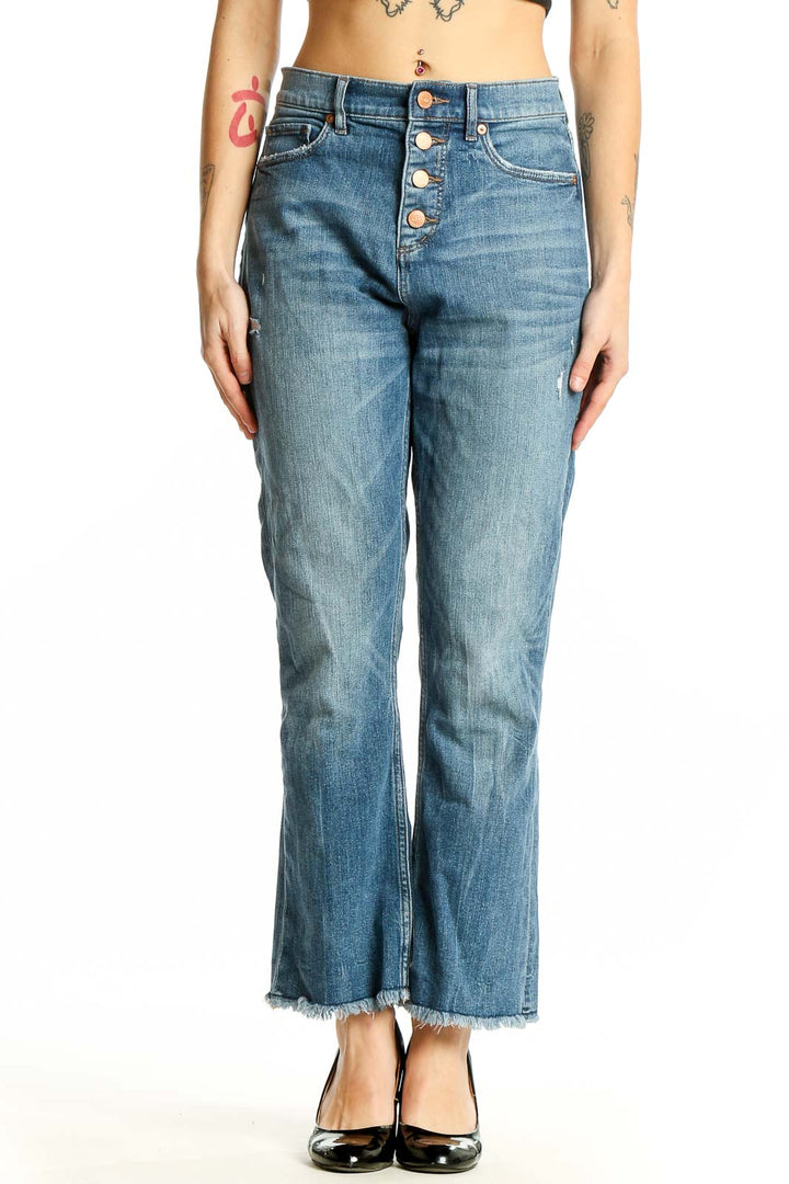 Front view of LOFT blue cropped flare jeans with button-fly