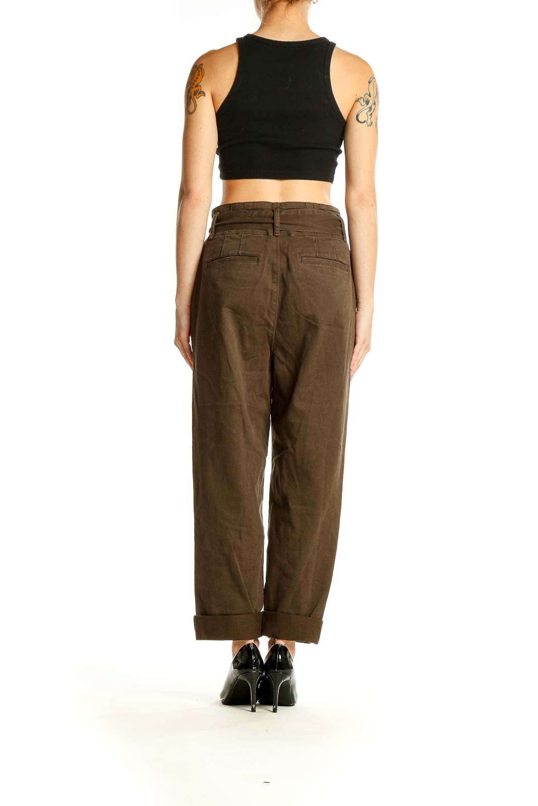 Side view of model wearing LOFT brown high-waisted paperbag trousers