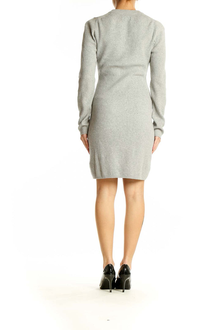 Side view of Gap gray ribbed knit sweater dress on model