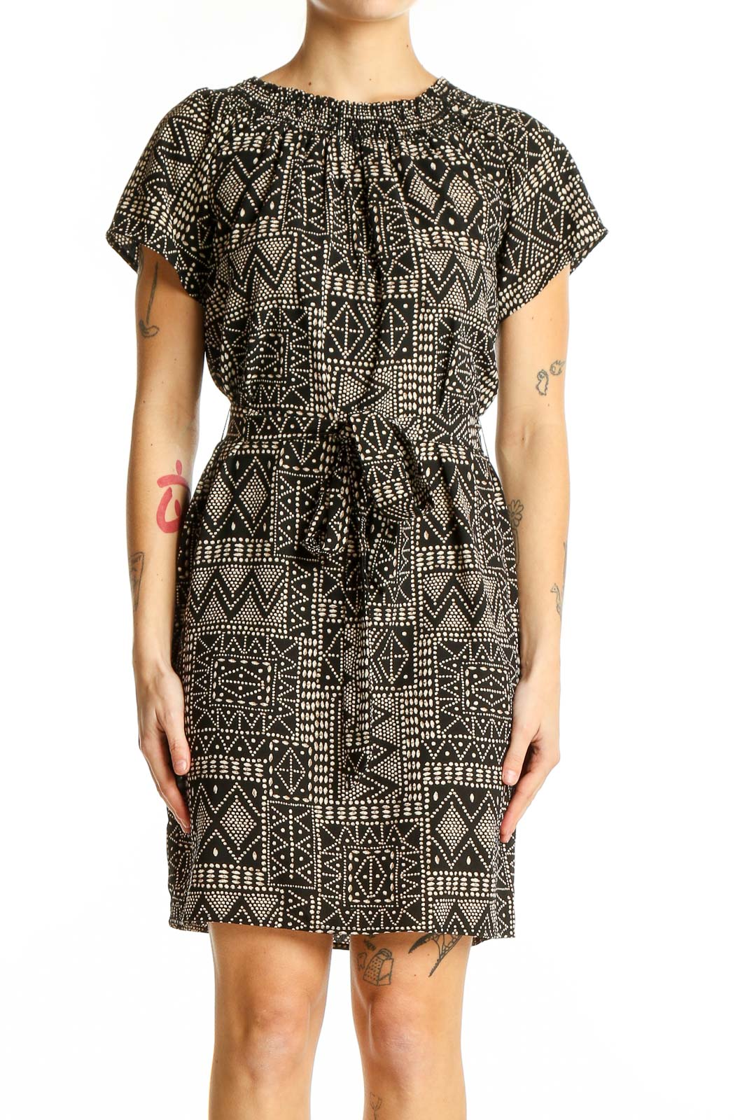 Front view of Veronica M black geometric print dress with tie waist