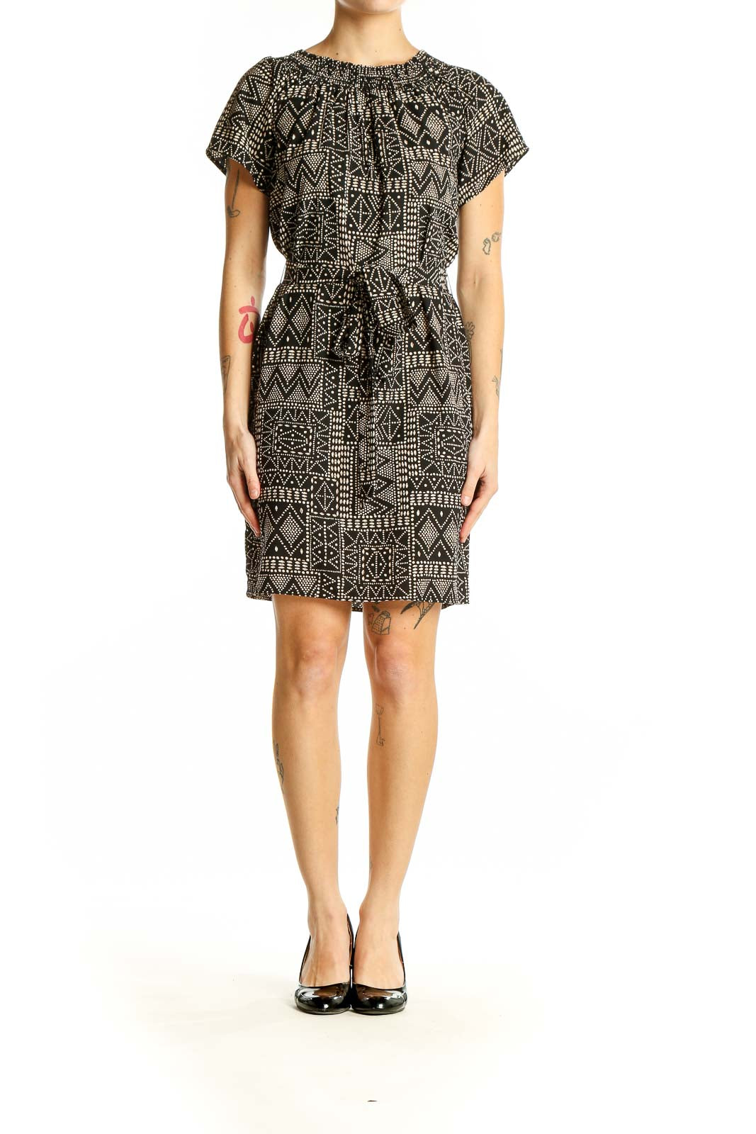 Front view of Veronica M black geometric print dress with tie waist