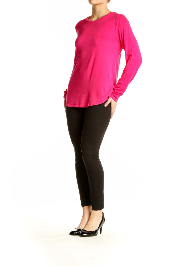 Front view of hot pink J.Crew long sleeve crew neck top