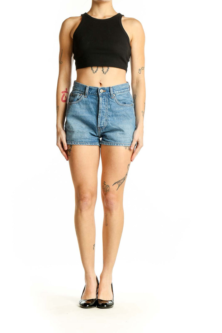 Front view of Rouge light blue high-waisted denim shorts with raw hem