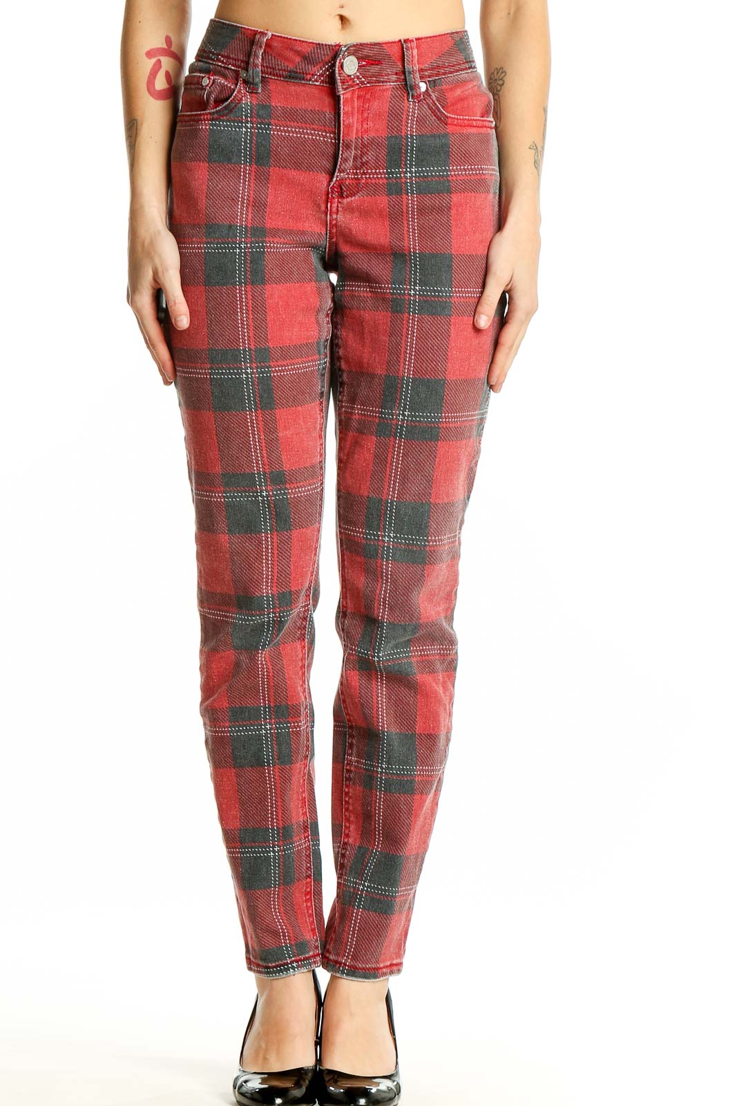 Front view of Indigo Rein red plaid jeans on model