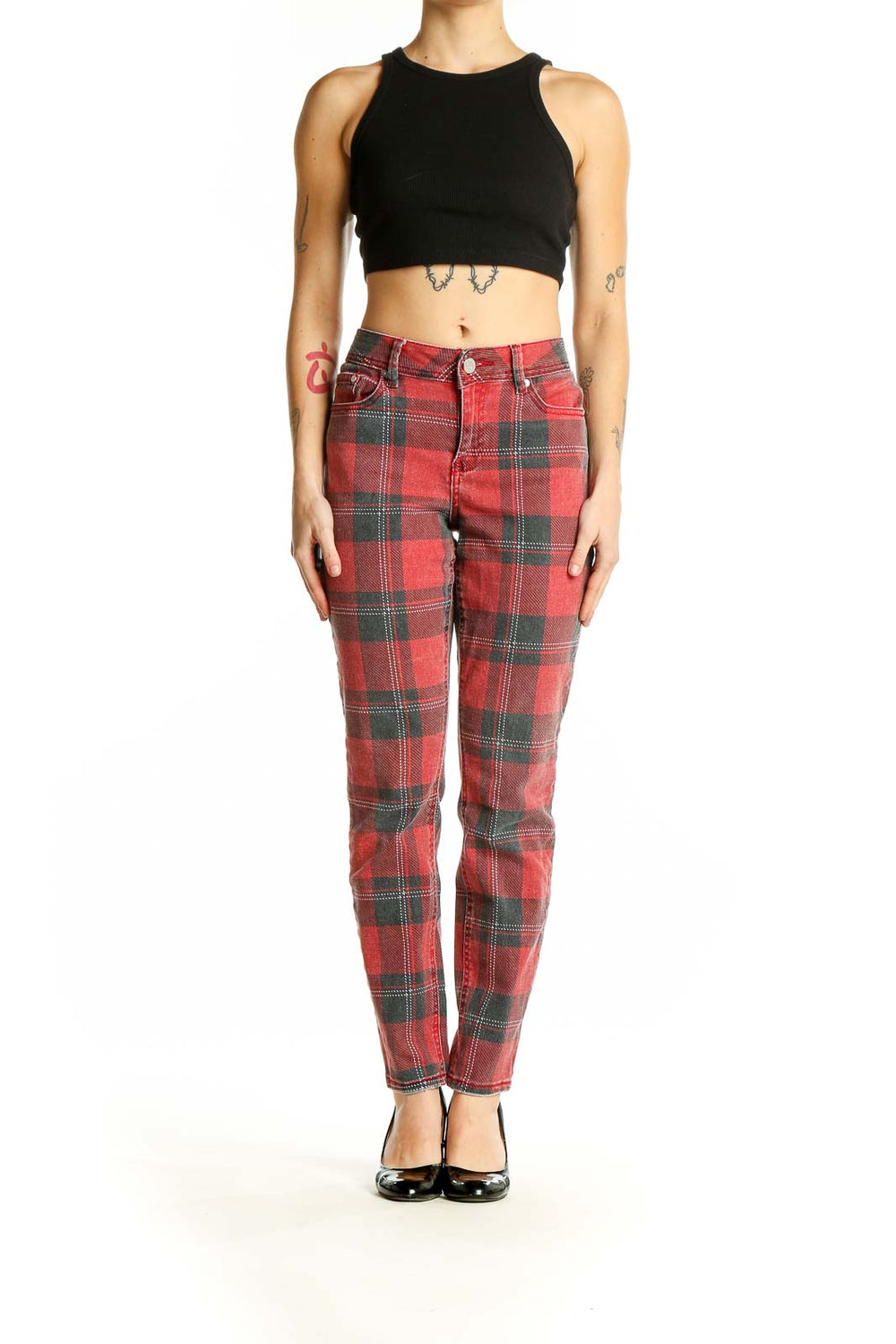 Front view of Indigo Rein red plaid jeans on model