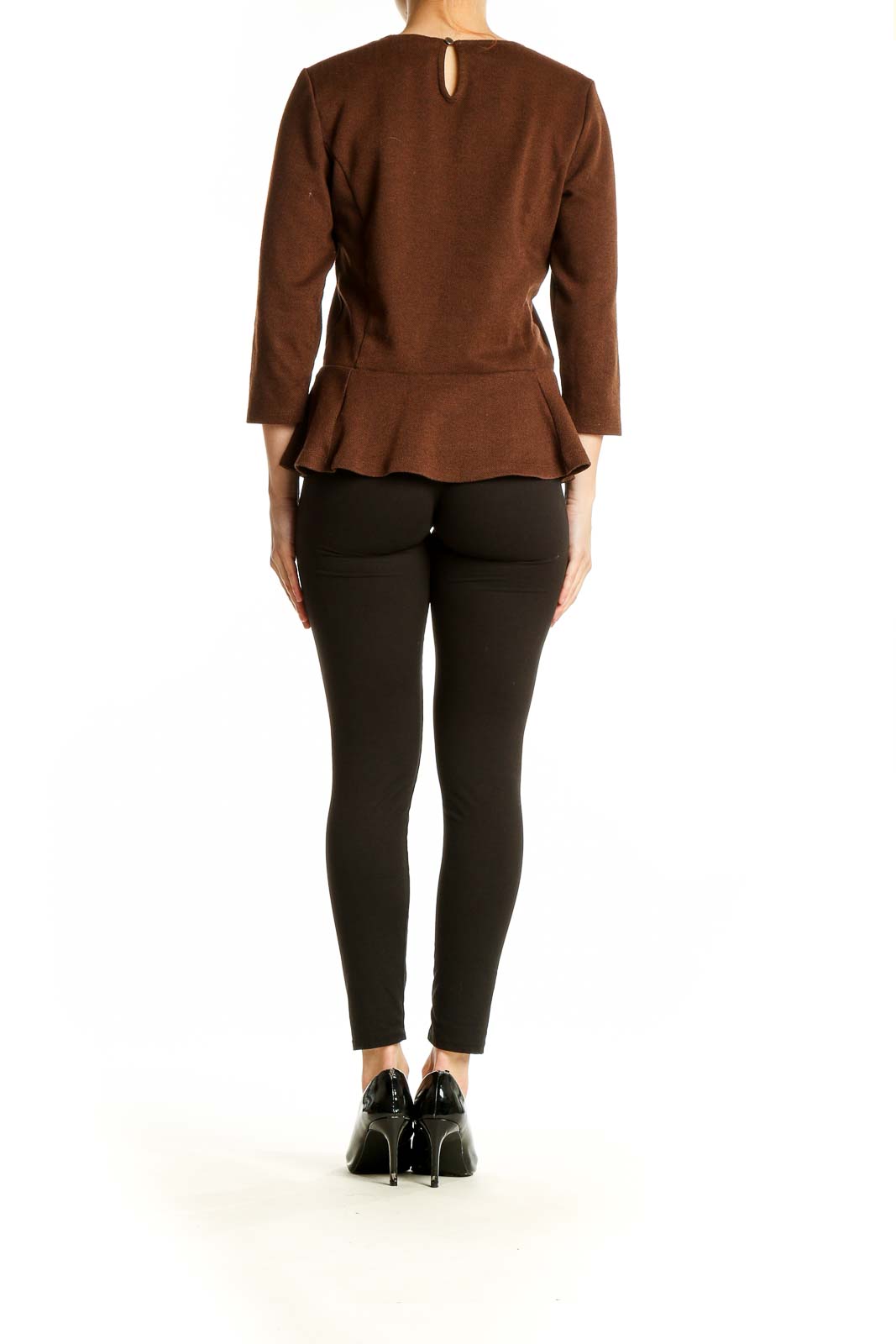 Side view of Lauren Ralph Lauren brown peplum top showing flattering silhouette