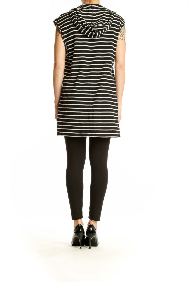 Side view of Black and White Striped Hooded Tunic Dress by Sunday on model