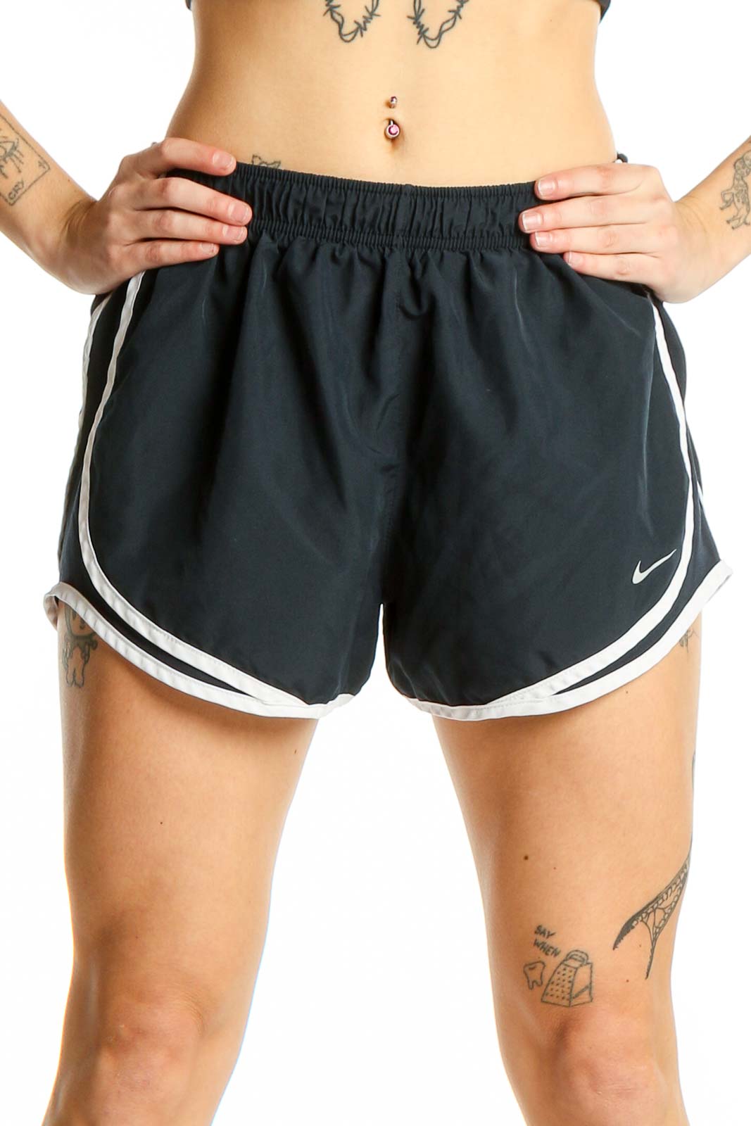 Front view of black Nike running shorts with white piping