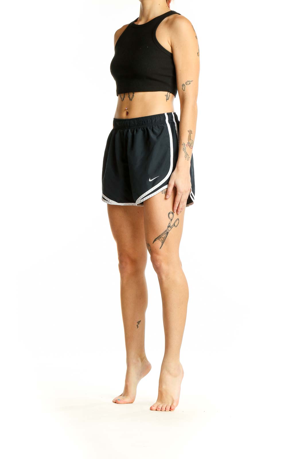 Front view of black Nike running shorts with white piping