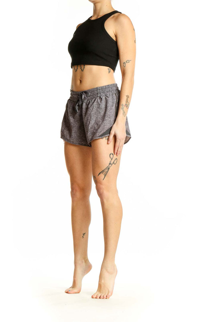 Front view of gray heathered Lululemon athletic shorts with drawstring waist