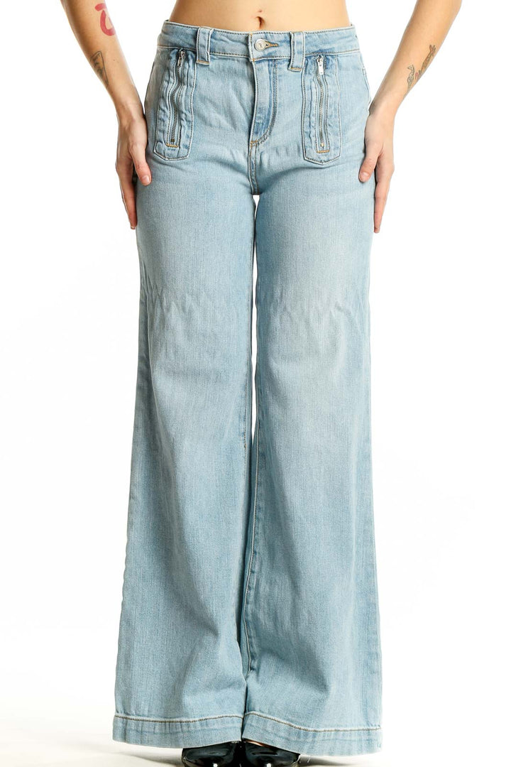 Front view of Pilcro and the Letterpress light blue wide-leg jeans with unique front pockets