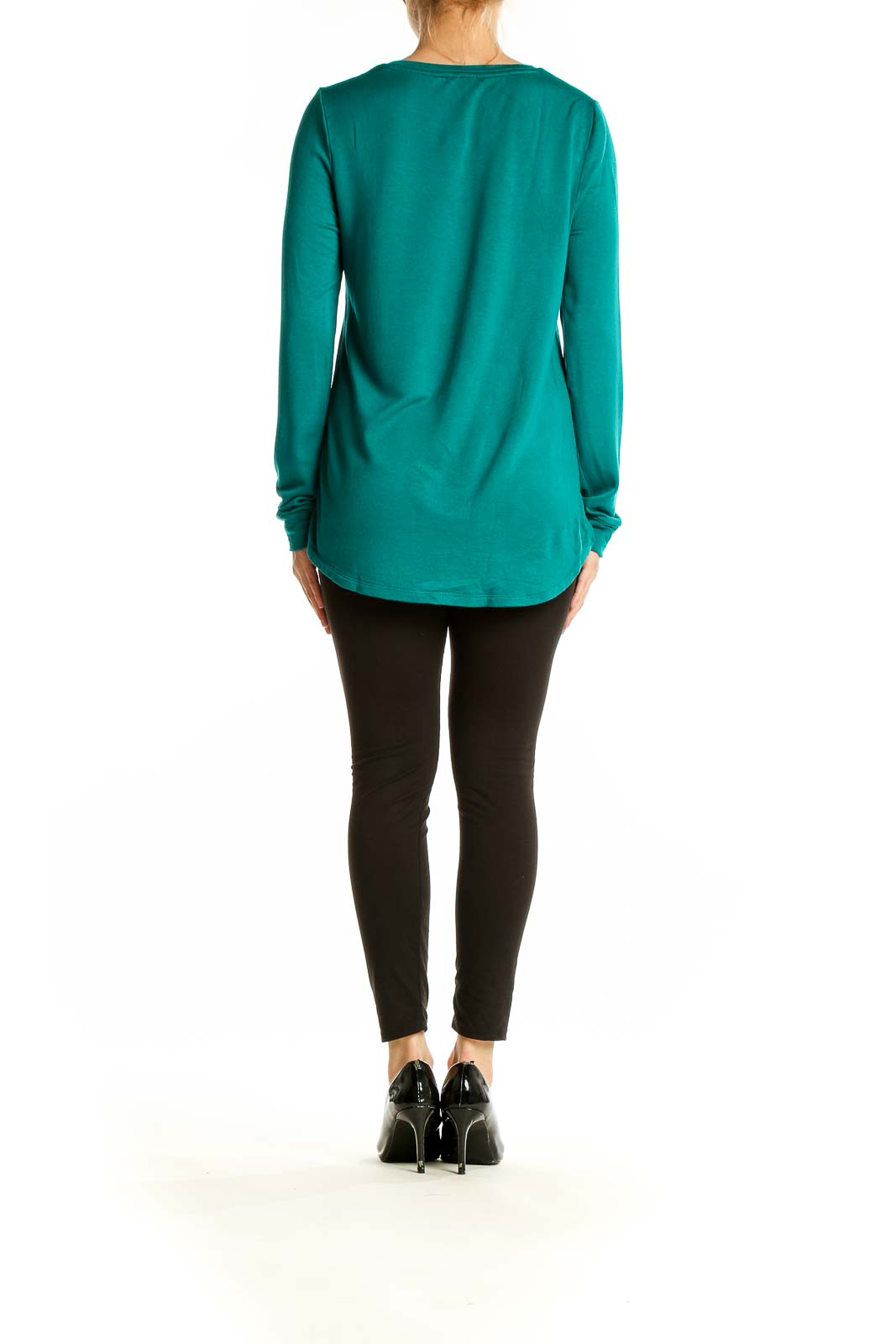 Back view of teal J.Crew long sleeve crewneck top on model with black pants