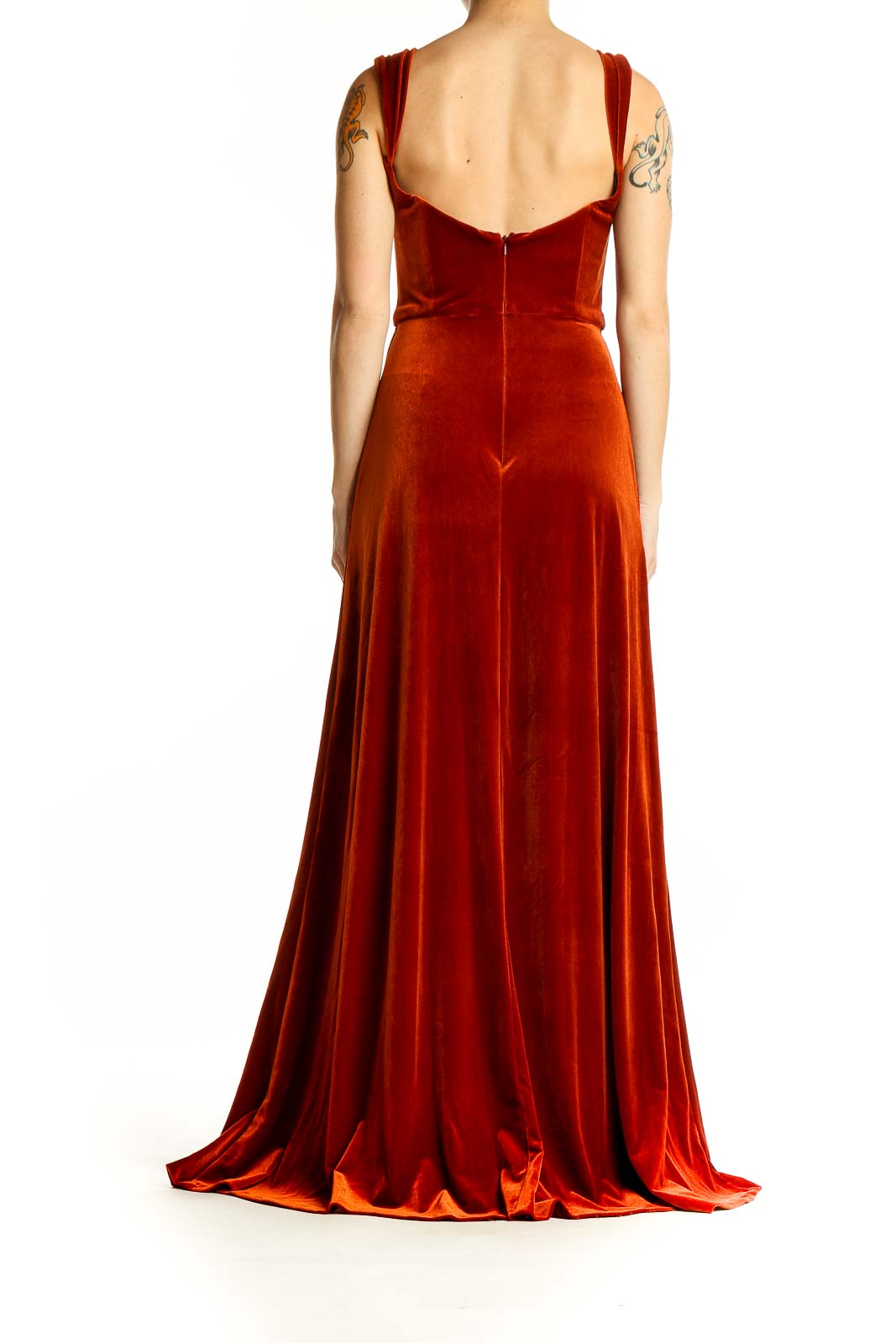 Back view of red velvet floor-length gown showing wide straps