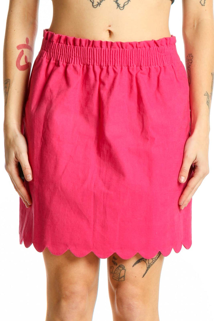 Front view of pink J. by J.Crew skirt with scalloped hem