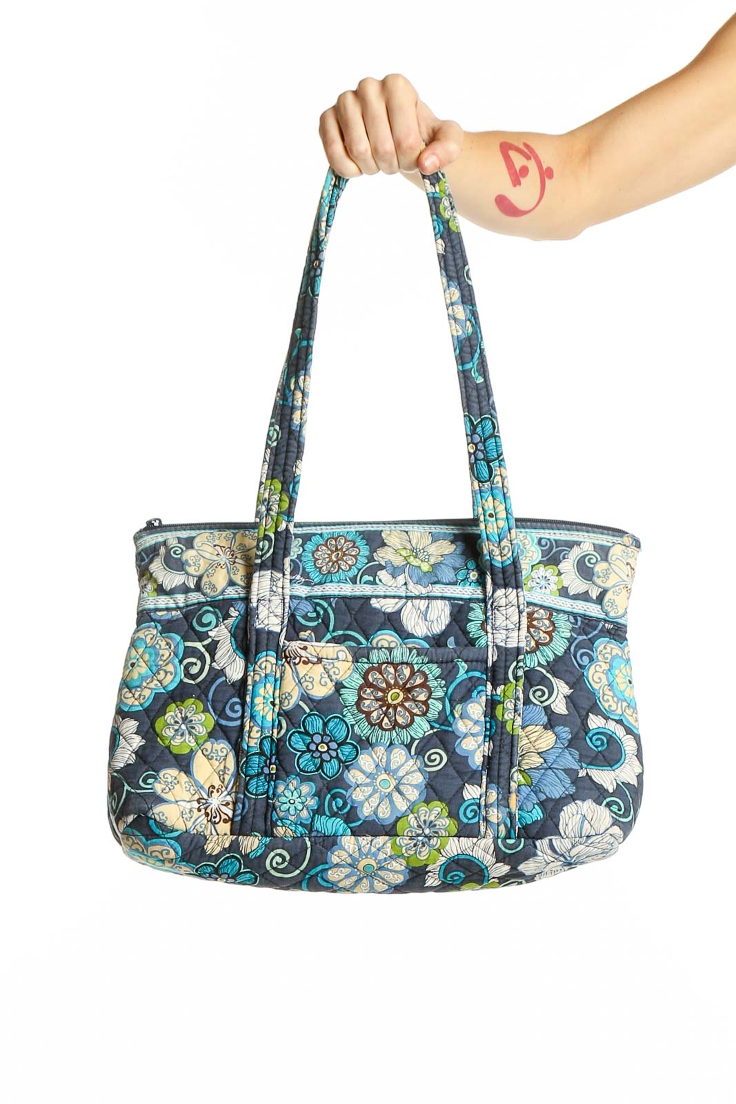 Front view of Vera Bradley blue floral cotton shoulder bag with quilted design