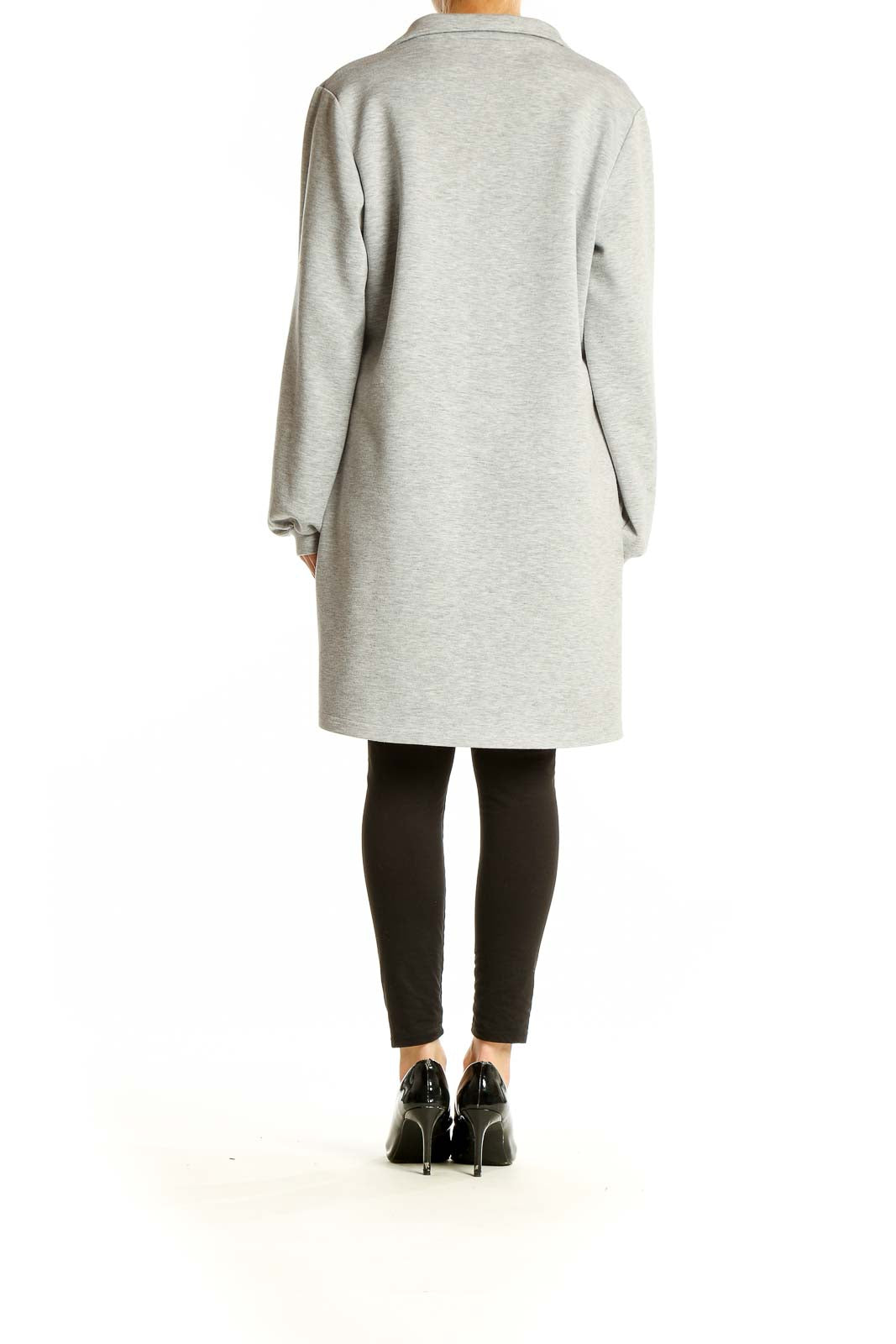 Side view of For Cynthia gray zip-neck sweater dress showing knee-length cut