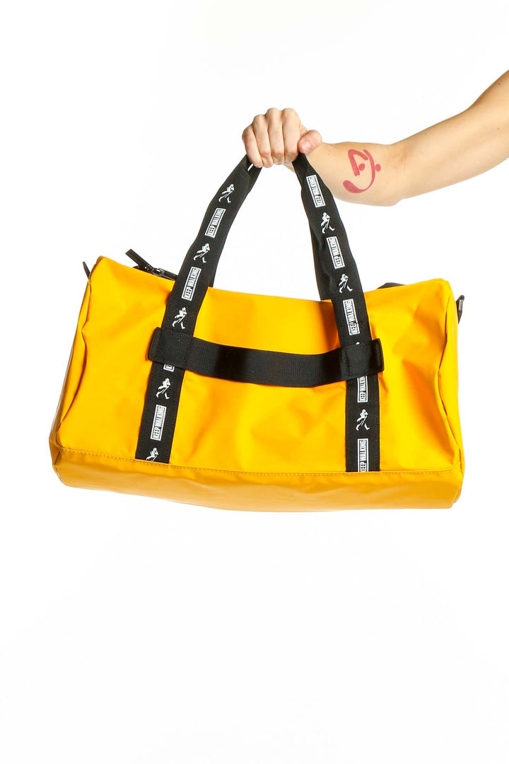 Front view of yellow sporty messenger bag with black straps