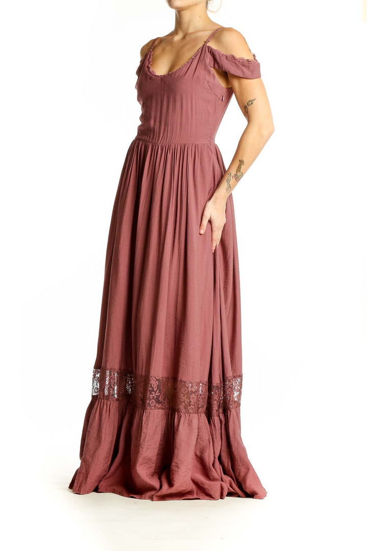 Front view of mauve cold-shoulder maxi dress with lace hem detail