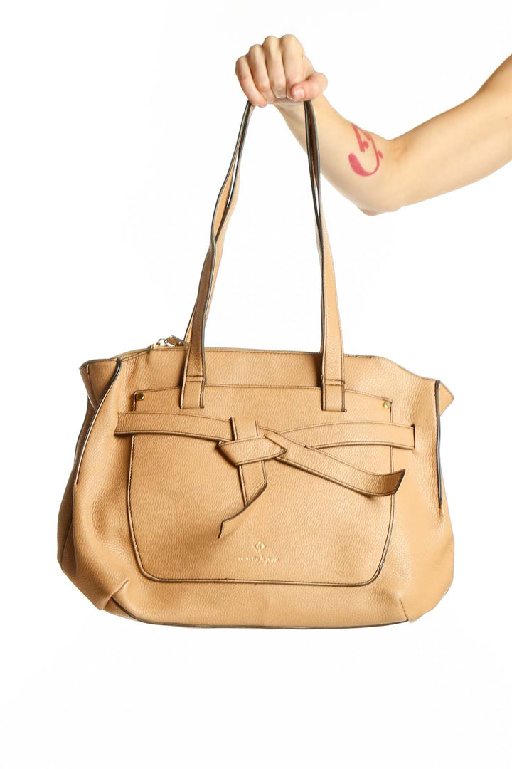 Front view of Nanette Lepore tan leather shoulder bag with bow detail