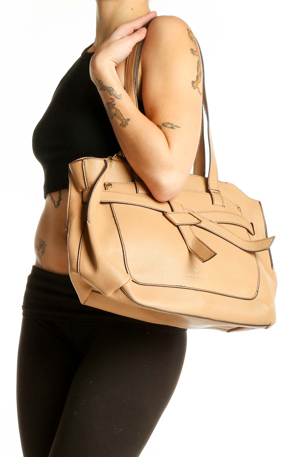 Front view of Nanette Lepore tan leather shoulder bag with bow detail