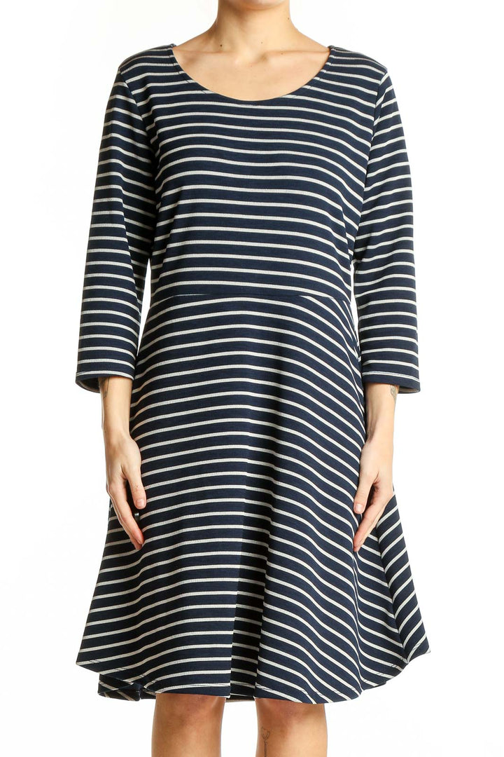 Front view of Gilli navy and white striped A-line dress with scoop neckline