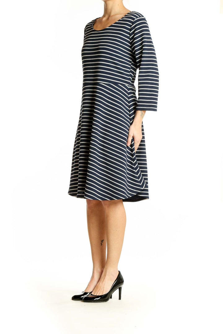 Front view of Gilli navy and white striped A-line dress with scoop neckline