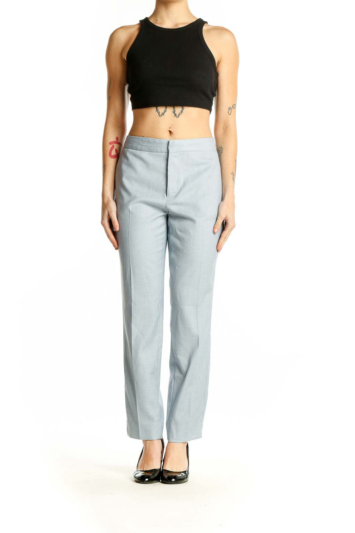 Front view of Zara light blue straight-leg trousers on model