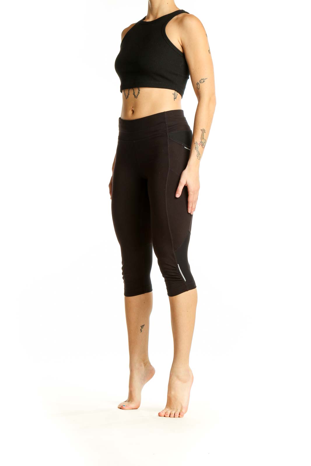 Front view of black Athleta cropped athletic leggings