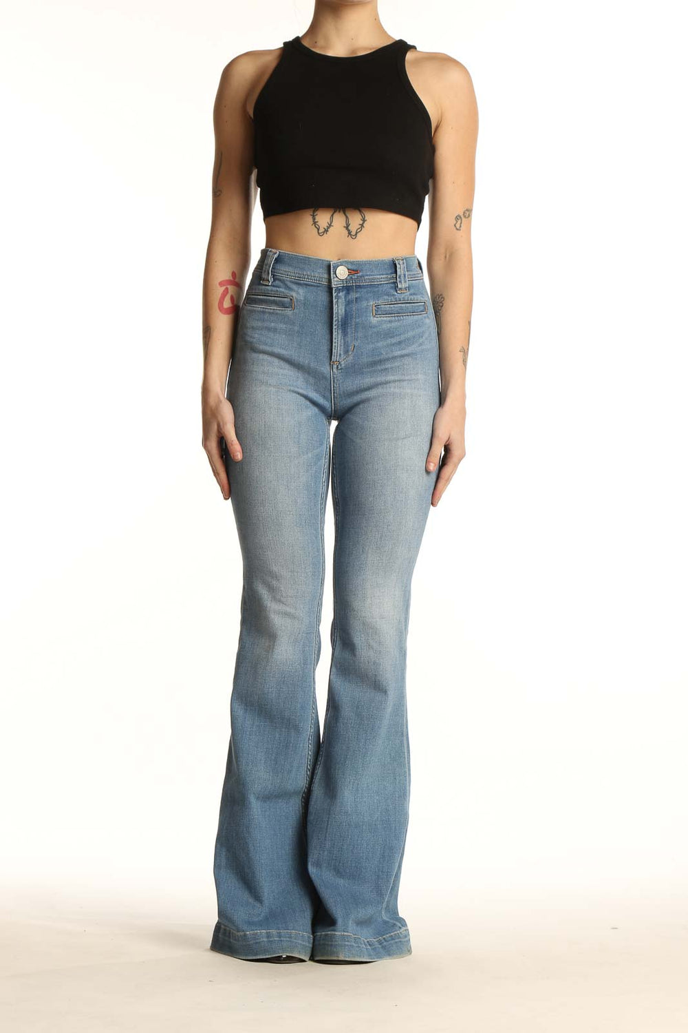 Front view of Ditto's light blue high-waisted flared jeans on model