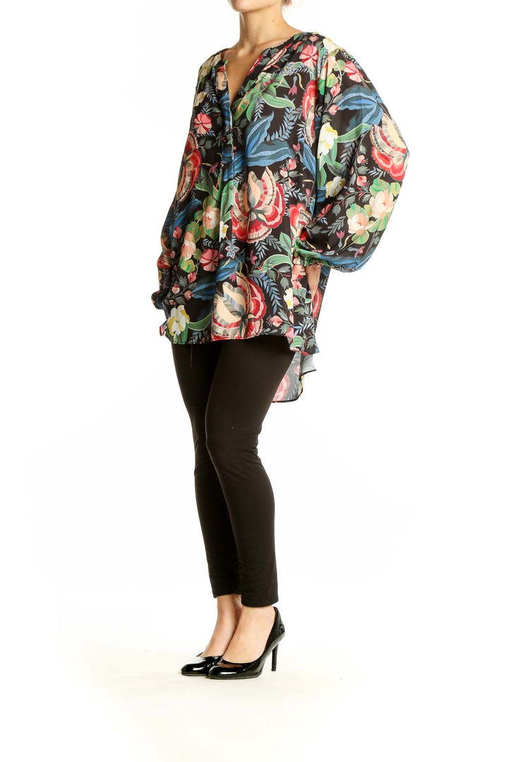 Front view of Tahari Black Floral Print Tunic Blouse with V-neckline and long sleeves