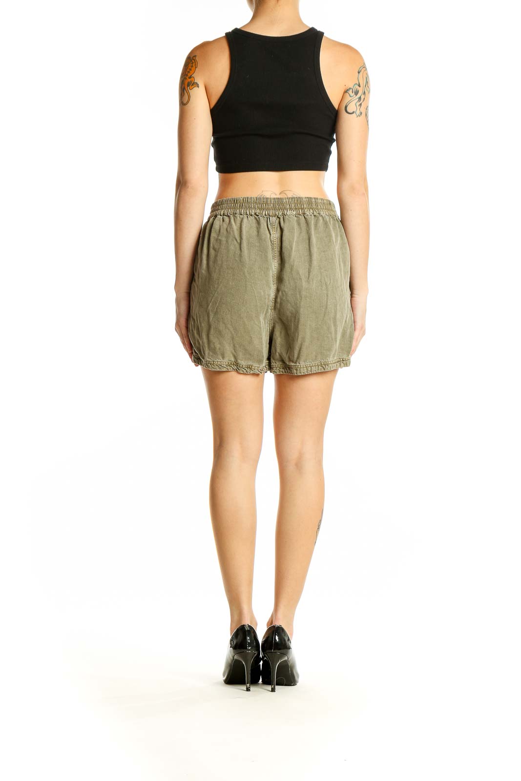 Side view of model wearing olive Treasure & Bond Tencel Lyocell shorts with black top