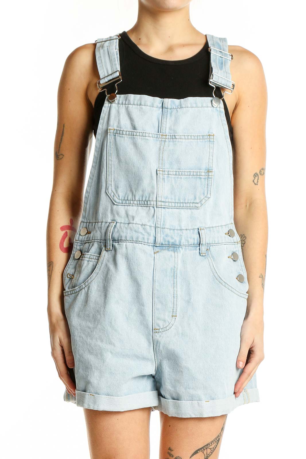 Front view of SilkRoll light blue denim short overalls with bib front pocket