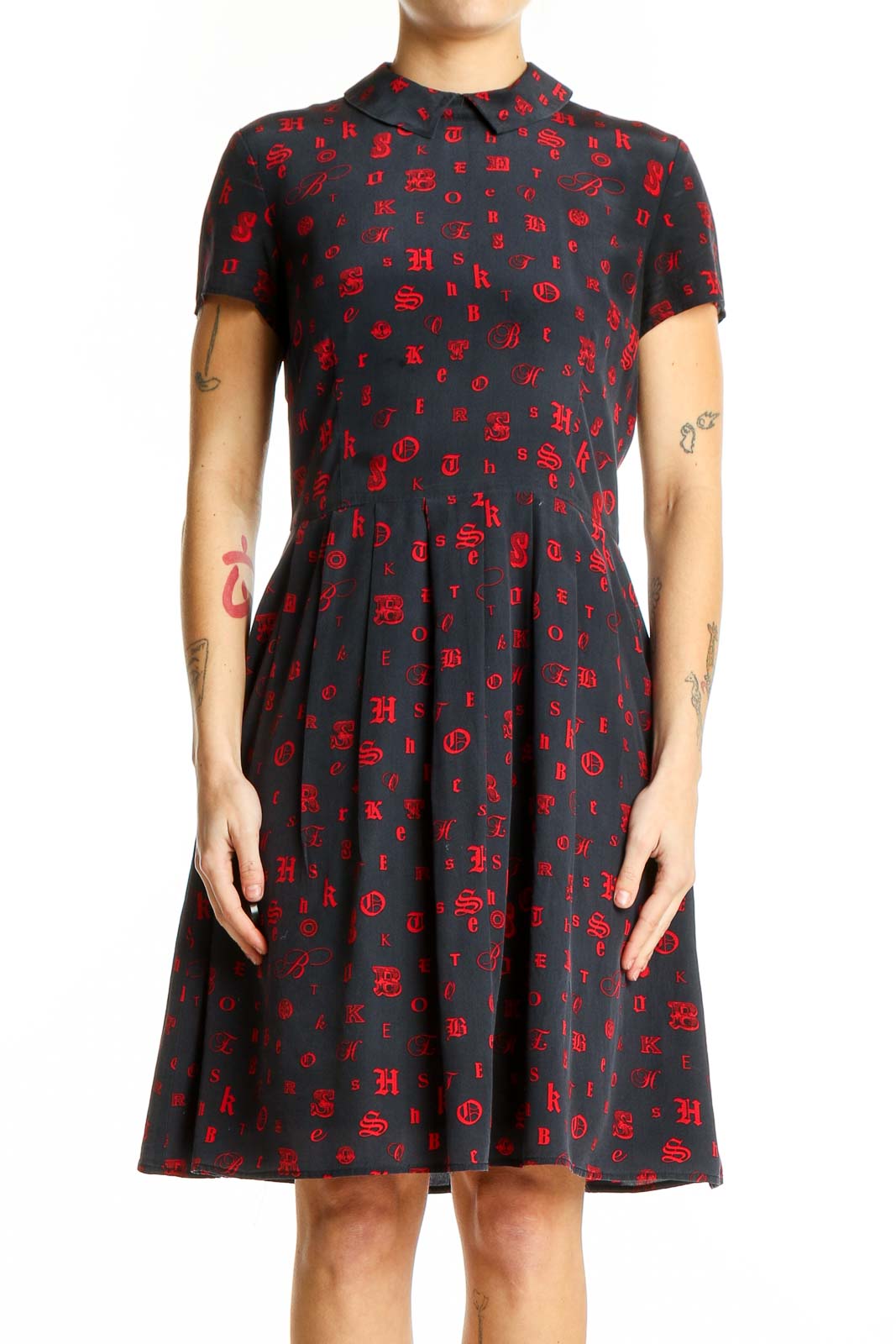 Front view of Brooks Brothers navy dress with red print and short sleeves