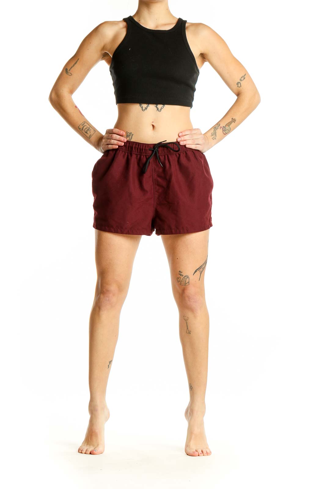 Front view of burgundy ASOS athletic shorts with elastic waistband