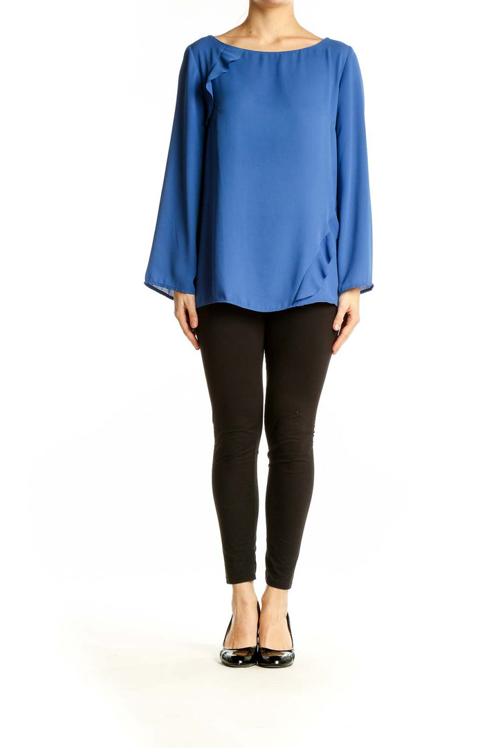 Front view of blue flowy Banana Republic blouse with ruffle details