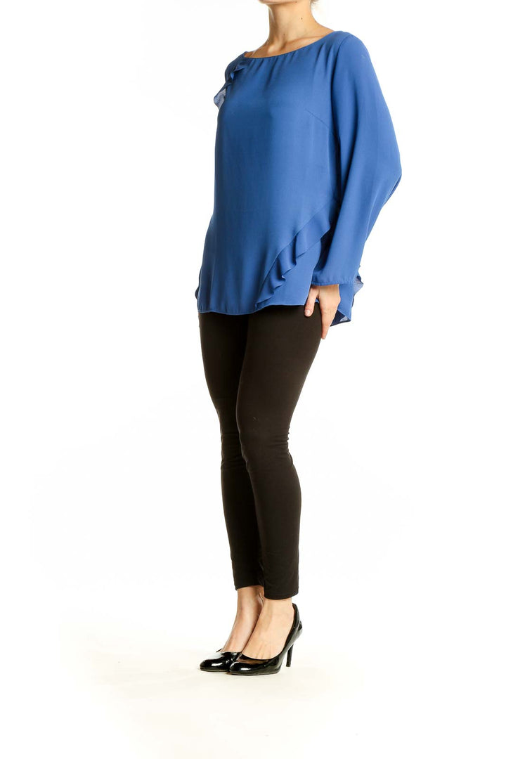 Front view of blue flowy Banana Republic blouse with ruffle details