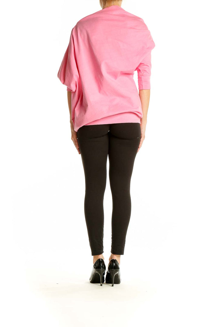 Back view of pink oversized FP Beach cotton top showing relaxed fit