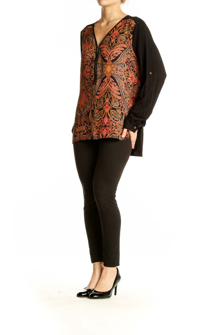 Front view of Adrianna Papell Black Floral Print Zip-Front Blouse with orange and red pattern