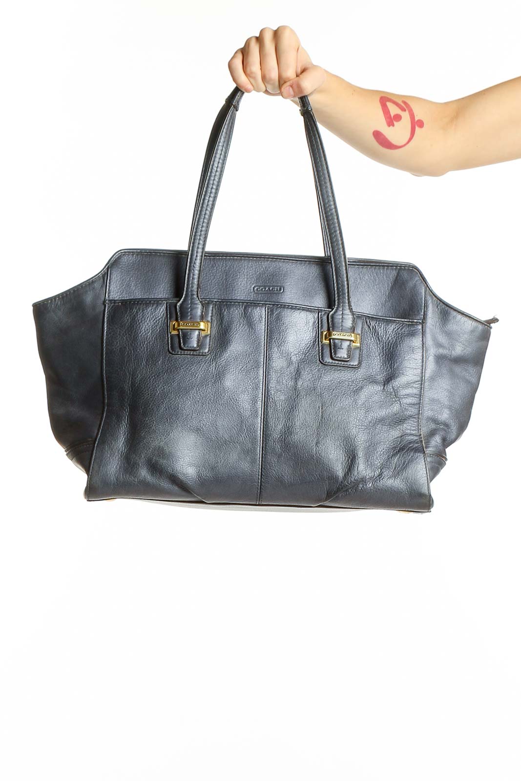 Front view of gray leather Coach tote bag with double handles