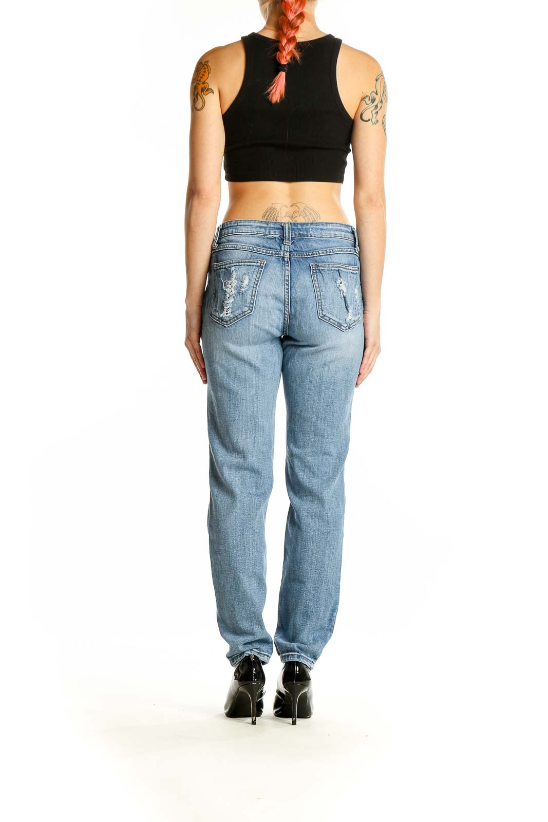 Side view of model wearing Pistola Light Blue Distressed Boyfriend Jeans with black crop top