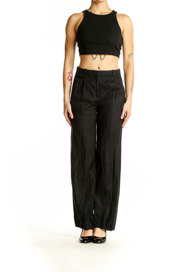 Front view of J.Crew black linen wide-leg trousers on model