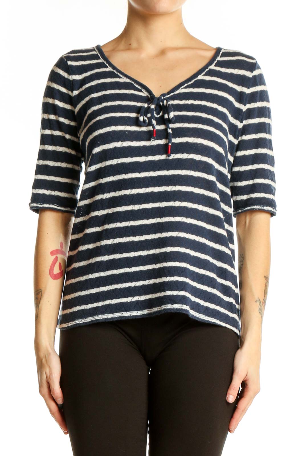 Front view of Lucky Brand navy and white striped V-neck top with tie detail