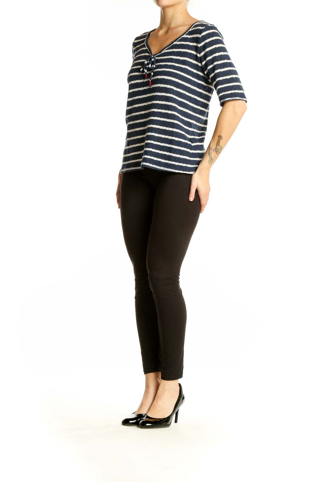 Front view of Lucky Brand navy and white striped V-neck top with tie detail