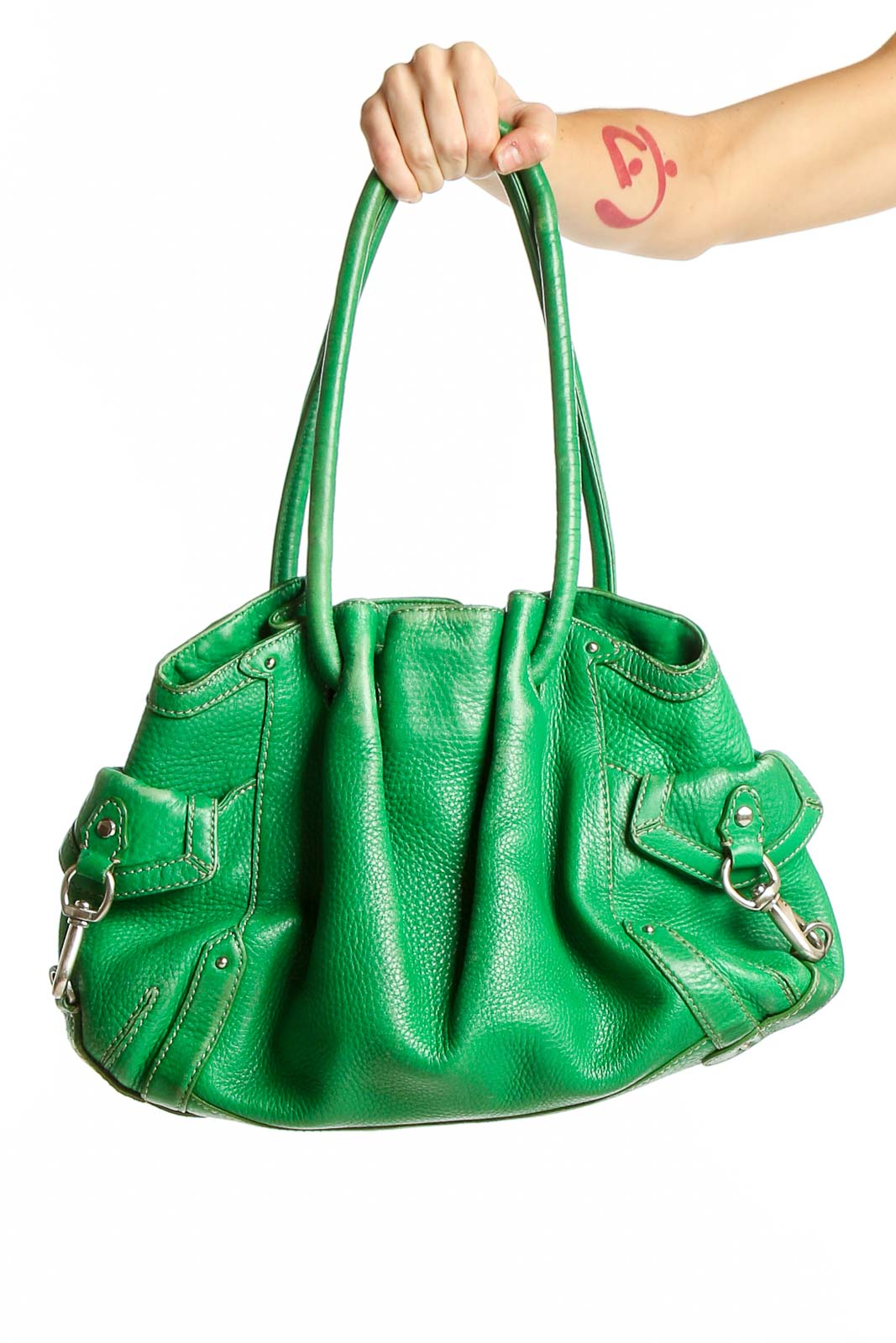 Front view of green Cole Haan leather shoulder bag with silver hardware