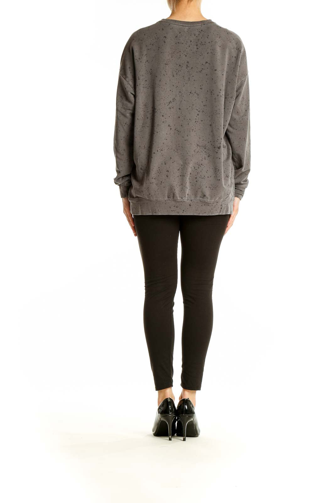 Back view of Athleta gray speckled oversized sweatshirt on model