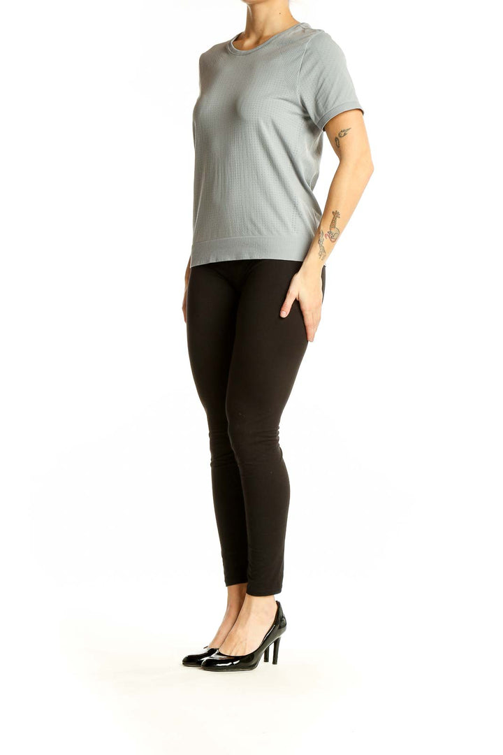 Front view of gray textured Athleta performance short sleeve top