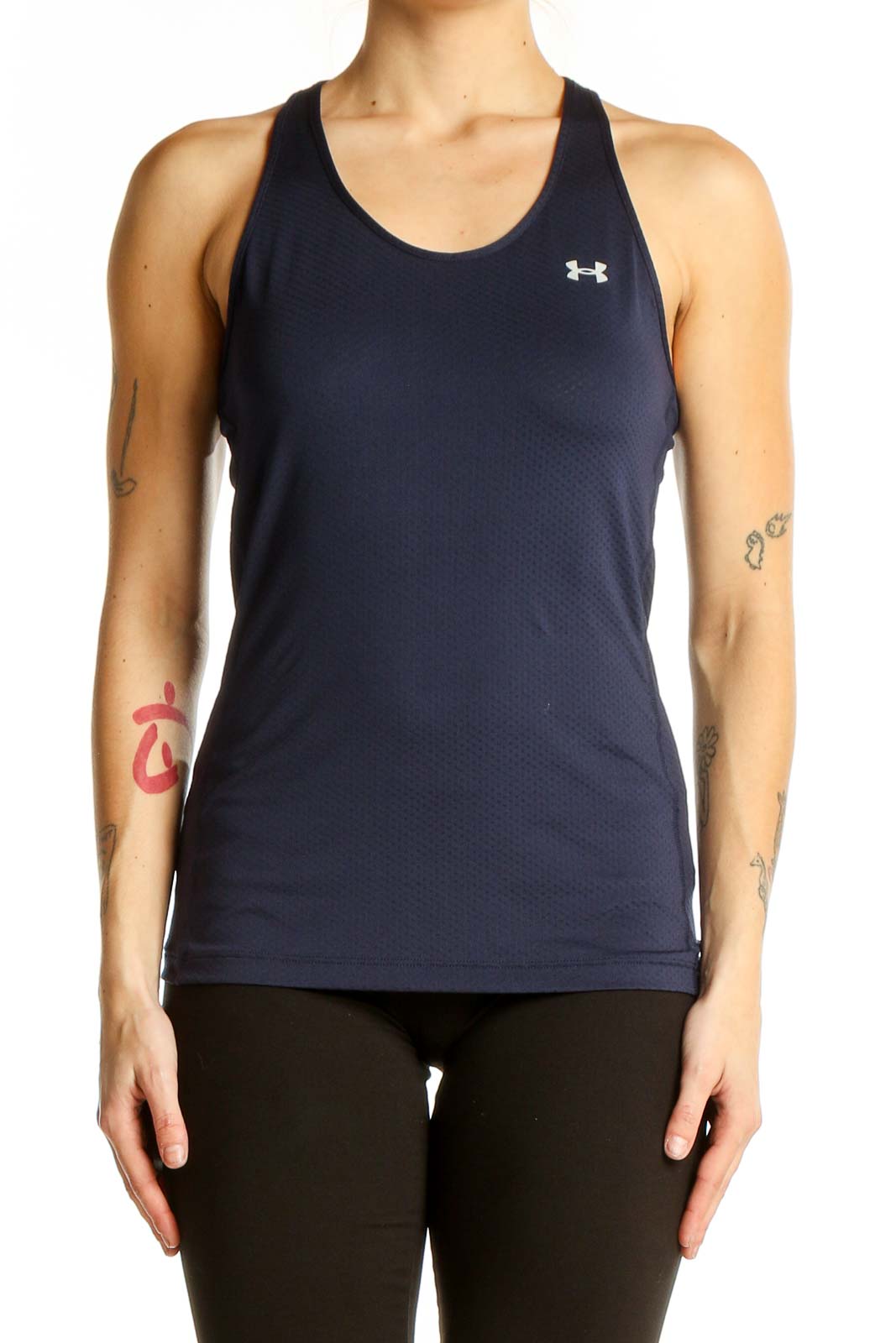 Front view of Under Armour navy racerback tank top on model