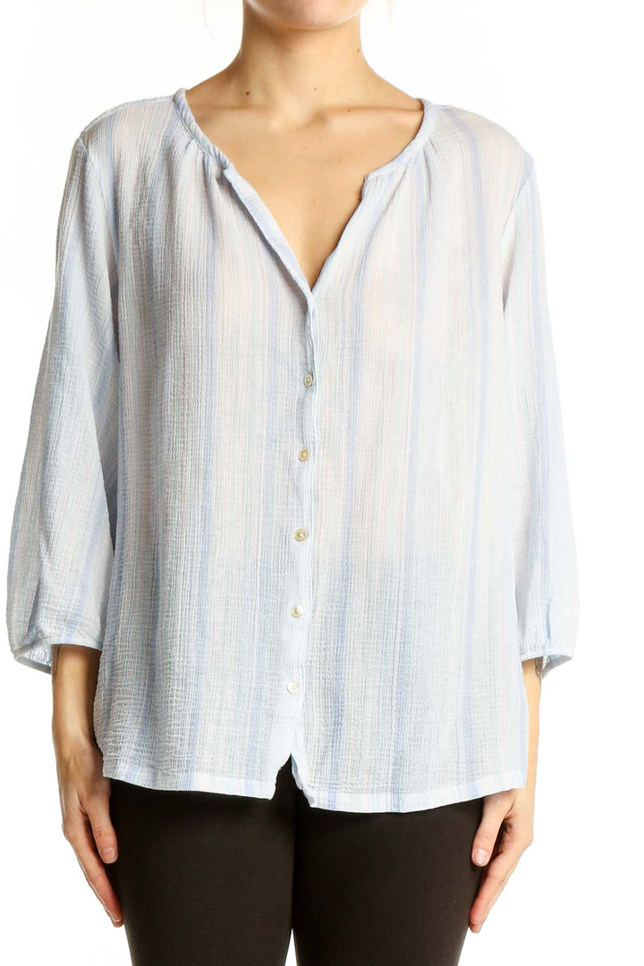 Front view of Tommy Bahama light blue striped cotton button-up blouse