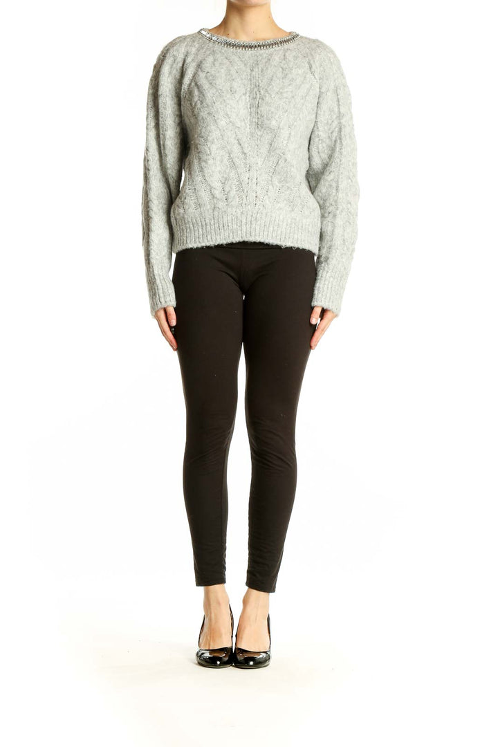 Front view of Express gray cable knit sweater with embellished neckline