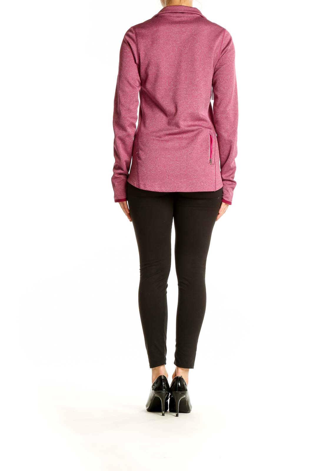 Side view of pink Nike athletic jacket showing fit and length